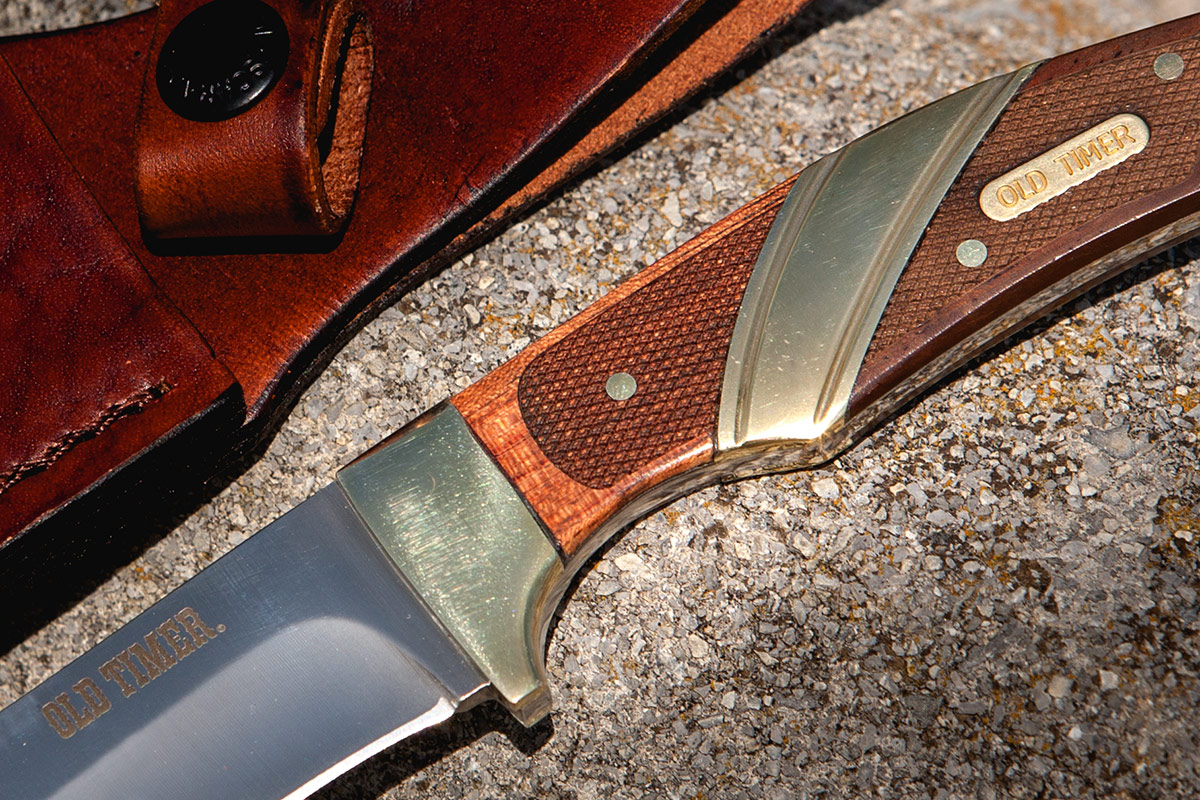 The font have of the Old Timer Capybara handle is rosewood and the back half is ebony. 